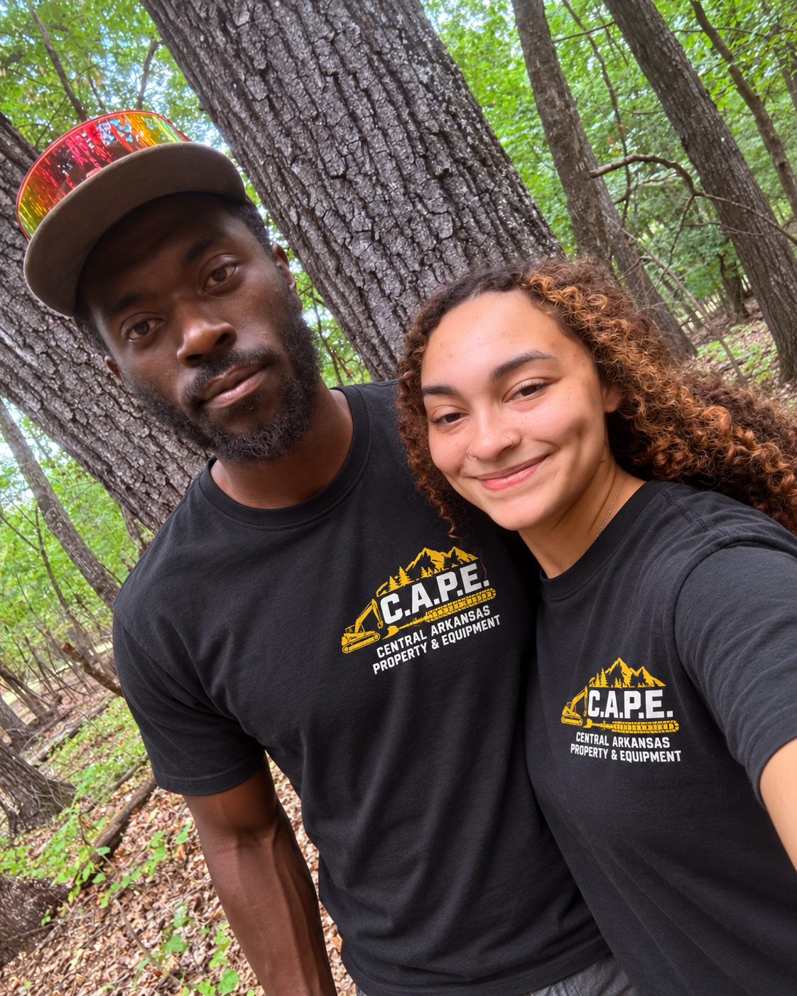 Gabby and Ryan, owners of Central Arkansas Property & Equipment, together outdoors